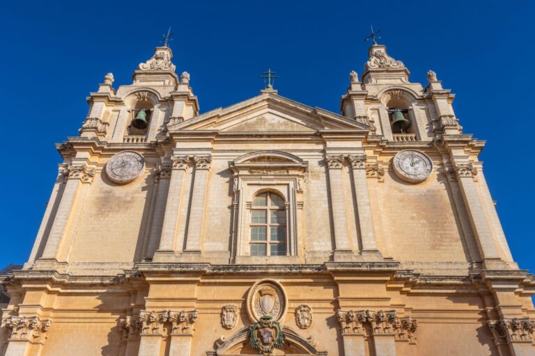 Why Do Churches in Malta Show Two Different Times?
